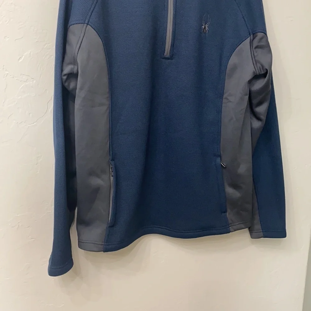 Spyder 1/4 zip Blue and gray jacket size medium.